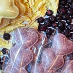 Lizak z białej czekolady z porzeczkami 21g